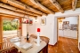 Dining room has doors opening to terraces